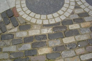 Limestone circle surround by Granite sets and Antique Granite cobblestone